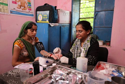 A young mother gets a health check-up at a sub-centre in one of the most remote areas in Rajasthan, India. Credit: CIFF