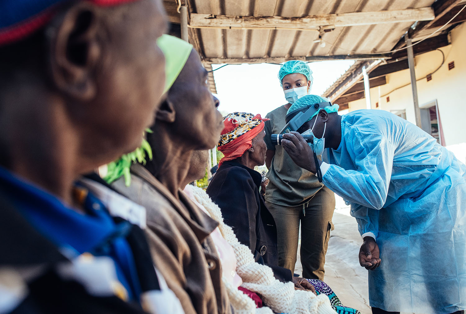 Surgeon screening local community members for trachomatous trichiasis via the Accelerate Programme. Credit: Sightsavers.